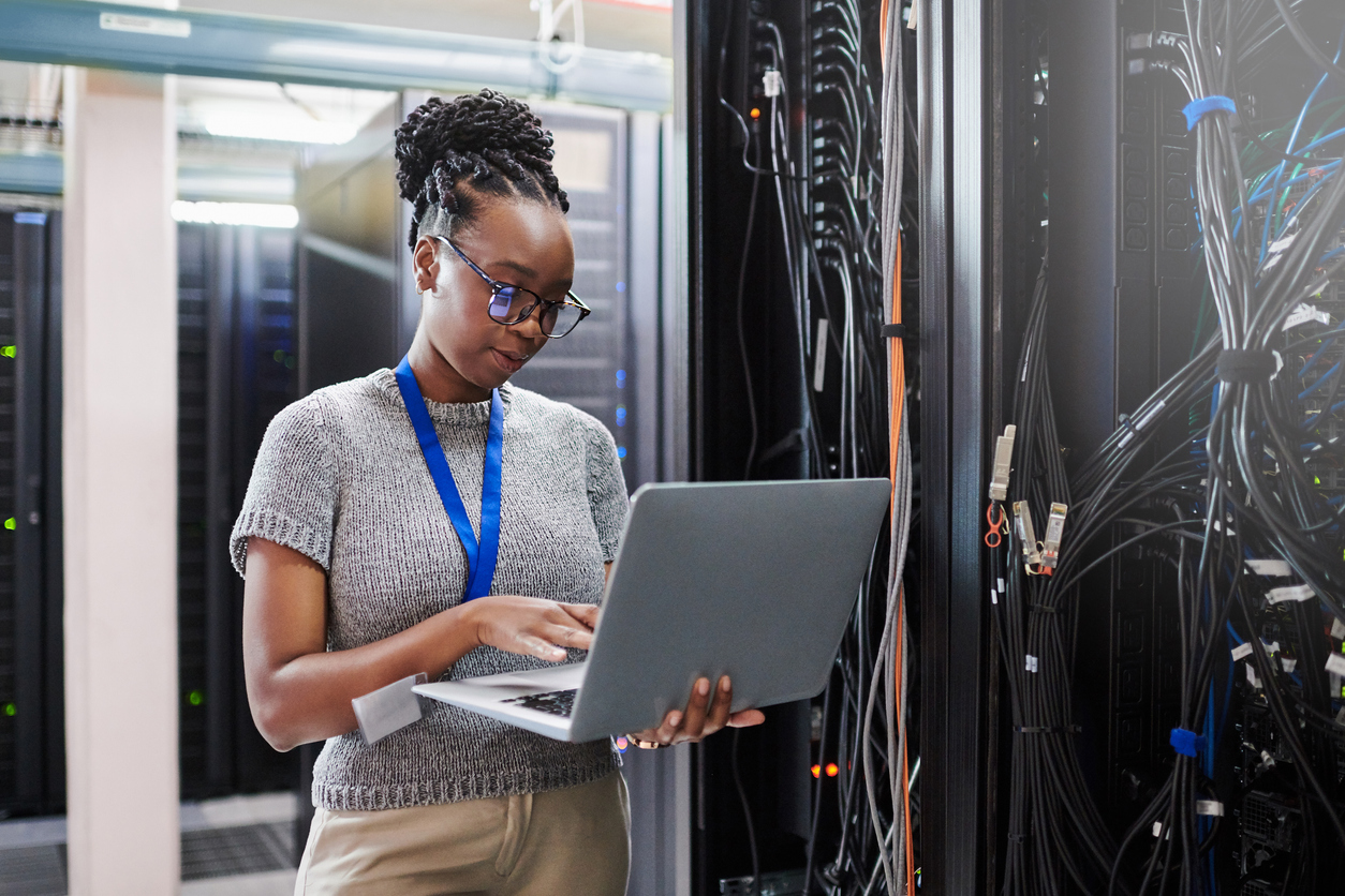 young woman performing systems maintenance at VETASSESS