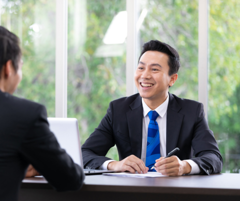 Man in suit smiling